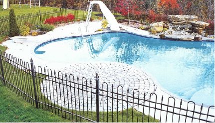 Simple black iron fence around a pool